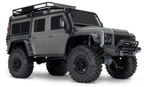 Traxxas 82256-4 TRX-4 Defender Silver Edition RC crawler with portal axles, clipless body, and Titan 21T motor