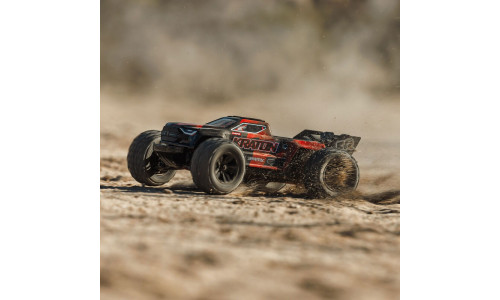 Arrma 1/16 Mini Kraton 3S DSC 4X4 RTR in black and red colours racing across sand with dust cloud, large tyres and Kraton side branding