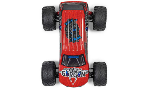 Top view of ARRMA Gorgon RC truck showing “DARE TO STARE” and snake-themed GORGON hood graphics