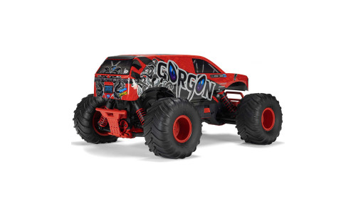 Red ARRMA Gorgon RC truck with deep-tread tires, red bumper, and angular grille design