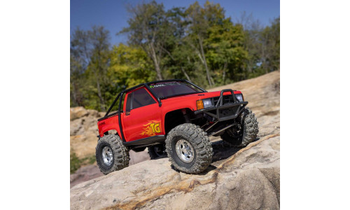 Axial 1/10 SCX10 III Toyota SR5 1987 RTR (AXI-2062T2) with realistic red body, advanced crawler geometry and rugged 4X4 capability