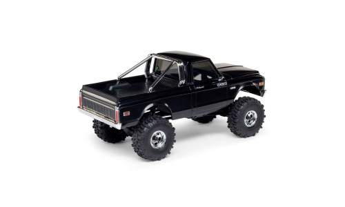 Side profile of black SCX30 Chevrolet K10 RC truck with V8 and SCX10 decals, chrome wheels, and roll bar