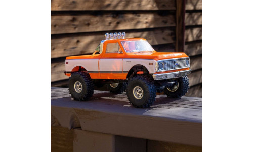 Axial AXI-3408T2 1/24 SCX24 1967-1972 Chevrolet C10 RTR in orange featuring detailed scale body and 4WD crawler chassis