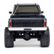 Rear view of SCX30 Chevrolet K10 RC truck with embossed CHEVROLET tailgate, chrome bumper, and roll cage